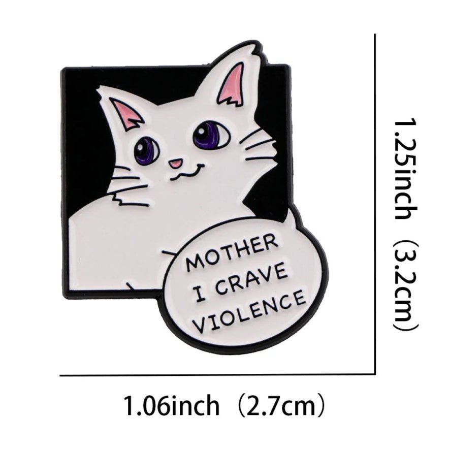 The Kiss Me Later white cat enamel pin features purple eyes and a speech bubble with Mother I crave violence. It measures 1.25 x 1.06 (3.2 cm x 2.7 cm).
